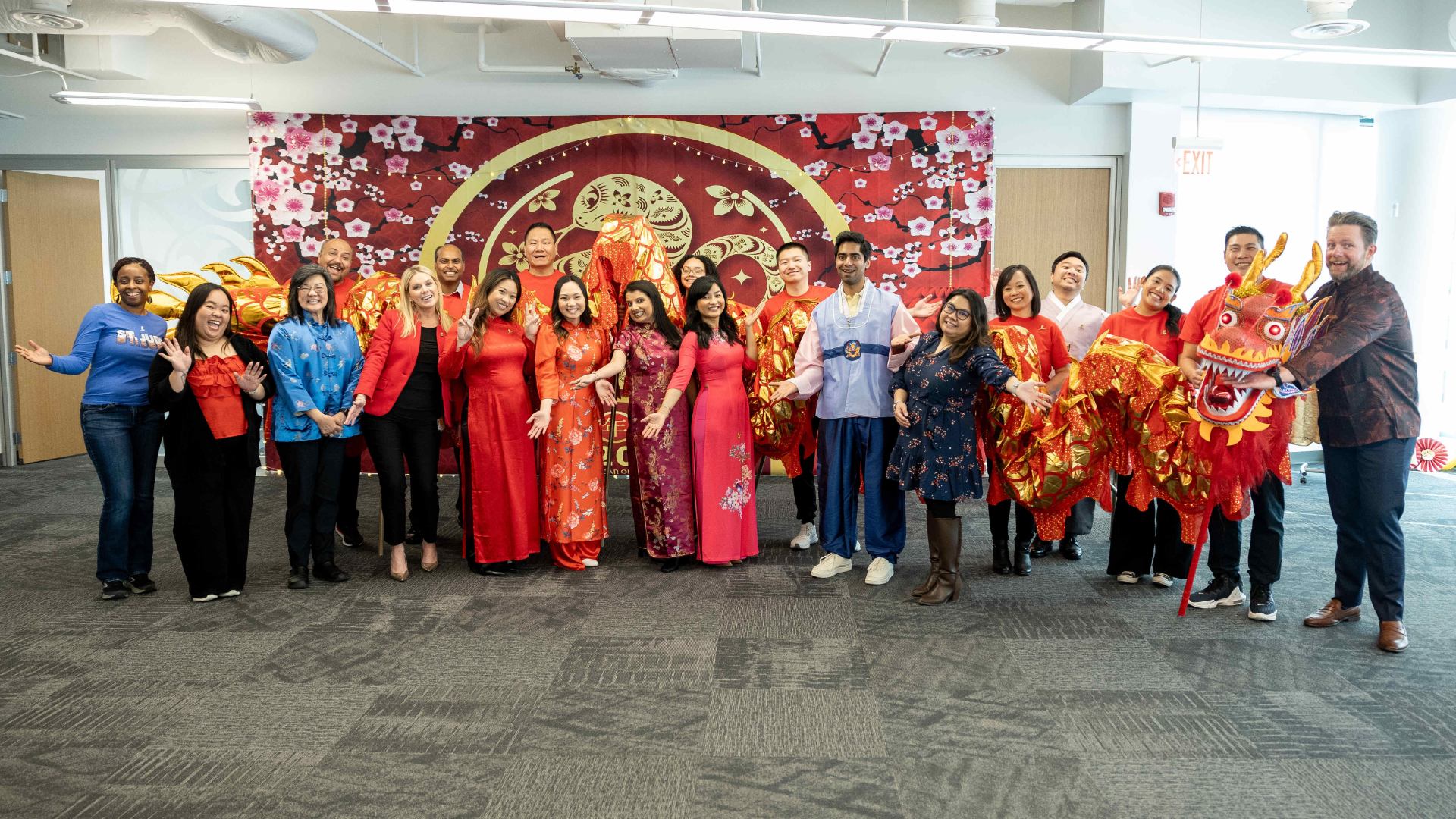 Yogesh Singh with a group of people, dressed in traditional Chinese dress.