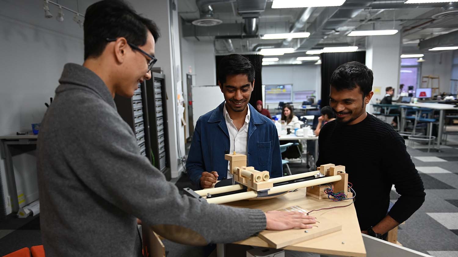 Yogesh Singh with his classmates, in a lab, testing an art installation they created.
